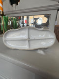 Underside of the figurine showing the moulded four-part base and impressed markings, including “WKC” and “30116.”