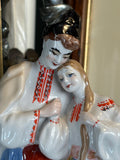 Close-up of faces on 'May Night' porcelain figurine by ZHK Polonne