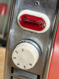 Close-up of control panel and light on vintage Sofono Spacemaster electric heater