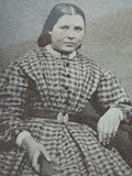 Victorian daguerreotype portrait of a young woman in checked dress, c.1850s.
