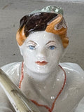Close-up of the figurine’s face, showing the heroic expression of Ivan Tsarevich with neatly painted blue eyes and stylised hair.