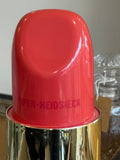Red lipstick-style top of Piper-Heidsieck wine cooler