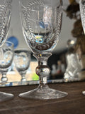 Close-up of Georgian cordial glass stem showing knop and engraved bowl