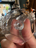 Close-up of glass foot showing knopped stem and thickness