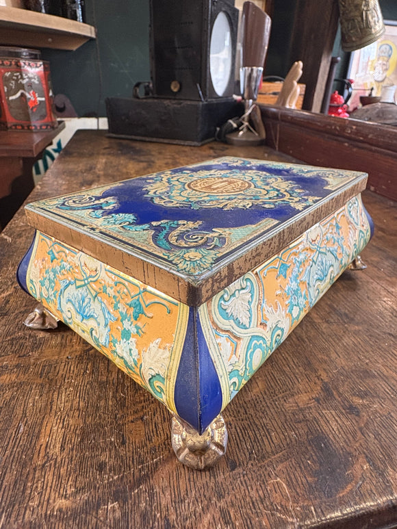 Angled view of colourful Russian decorative tin box