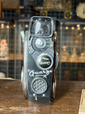 Front view of Quarz M 8mm film camara, USSR, clockwork driven