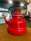 Vintage mid-century red enamel kettle with black handle