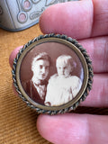 Victorian tintype brooch held in hand, showing portrait detail