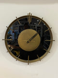 Mid century brass and glass wall clock