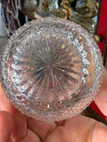 Base of Edinburgh Crystal whisky glass showing faceted star cut