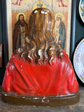 Back view of vintage Jesus figurine showing painted hair and robe
