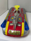 Vintage tin space rocket car