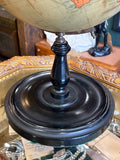 Close-up of the original ebonised baluster column and stepped circular base of a 1920s Philip's table globe