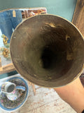 Interior view of vase looking down through the copper body