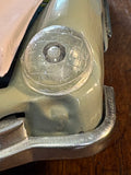 Close-up of second headlight and front wing detail