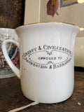Reverse of WWI cup printed with Liberty and Civilization slogan