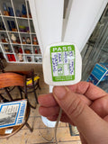 Close-up of electrical safety test PASS label attached to lamp cable