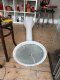 Bonaldo Eos lamp laid down showing shade and circular base plate