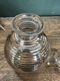 Open scent bottle showing silvered stripe design