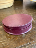 Closed lid of the original fitted box for the medallion