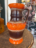 Vintage West German fat lava jug by Ü-Keramik in orange and brown drip glaze