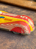 Rear three-quarter view of JBP 501 tinplate racing car showing tail fin and number 5 detail