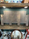 	Reverse view of coat rack showing wooden backing board and mounting hardware