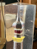 Close-up of onion-domed lantern top on plexiglass lighthouse