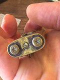 Base of Soviet lighter with hammer and sickle engraving