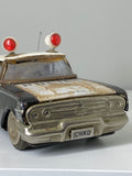 Mid century Ichiko Chevrolet Impala toy police car