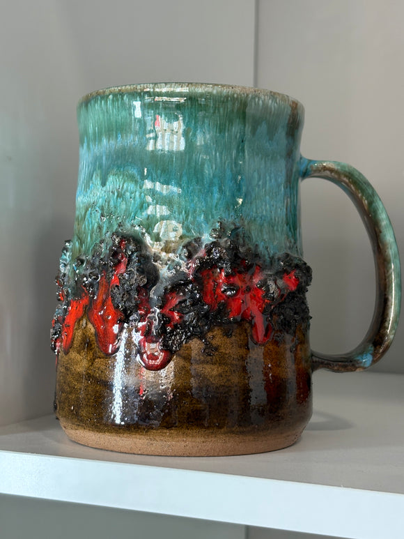 Vintage Glit Iceland lava glaze pot with handle in red and green tones