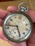 Moeris military pocket watch dial held in hand