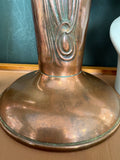 Close-up of flared copper vase base with brass-to-copper join