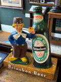 Vintage 1970s Heineken beer bar advertising display with bottle and figure