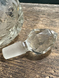 Faceted glass stopper of antique cut glass perfume bottle