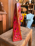 West German Fat Lava vase, side angle, showing twisted form and glossy glaze runs.