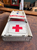 Rear view of vintage Japanese tinplate ambulance showing Ambulance text roof sign and Made in Japan marking