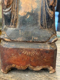 Red-lacquered throne base with gilt floral decoration on antique Chinese figure