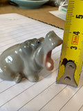 Lomonosov hippopotamus measured with tape measure showing height