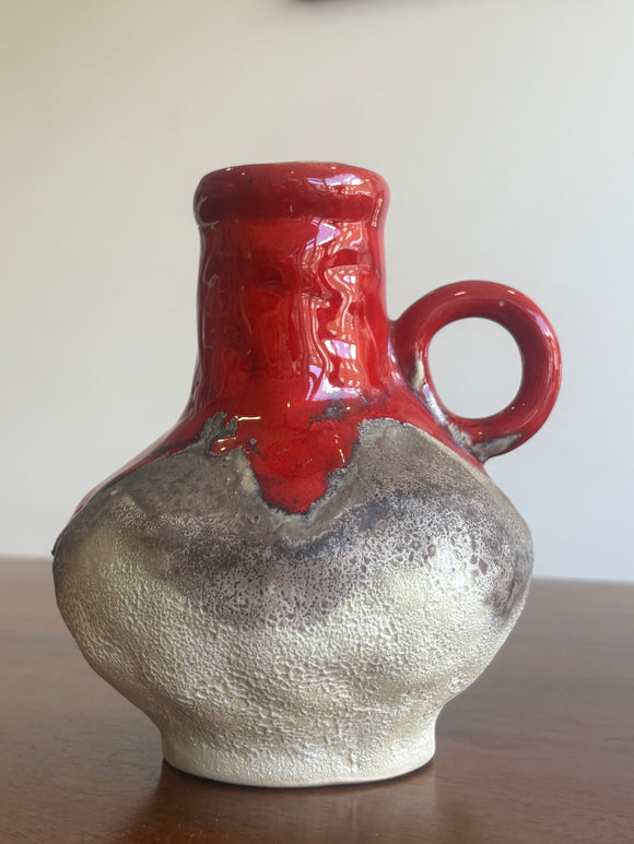 1960s Jasba Keramik fat lava vase with red glaze and textured cream-brown base, marked WB90/2, 4cm high. 