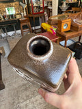 Top view into vase opening showing glazed interior and rim