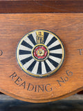 Close-up of carved and painted Round Table Reading No. 6 roundel with Tudor rose
