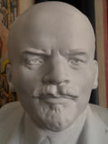 Close-up of Lenin's face on white porcelain bust, Soviet-era