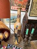 Ceramic Cinzano advertising bottle, reverse side, showing Art Deco figure in hat and suit.