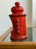 Side view of 1970s Pan Keramik red pottery tealight holder
