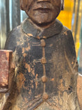 Carved frog fastenings on black robe of antique Chinese ancestor figure