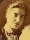 Close-up of woman's face in Victorian tintype brooch portrait
