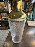 Vintage Art Deco glass cocktail shaker with gold metal top and etched pattern