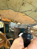 Antarctic detail of a Philip's globe showing Enderby Land and Kemp Land, with the brass lower pivot and meridian