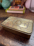 Princess Mary Christmas 1914 brass tobacco tin on wooden table